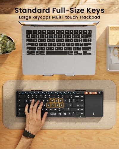Black foldable travel keyboard with touchpad — photo 5
