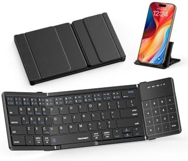 Foldable travel keyboard with integrated touchpad